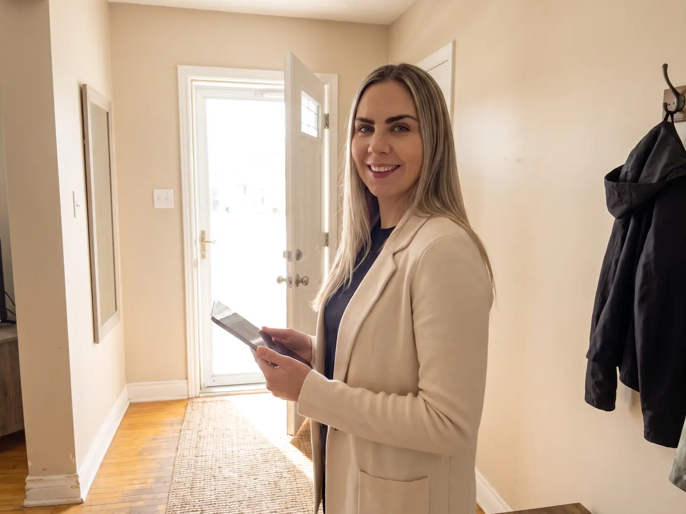 Adela welcoming buyers to a showing